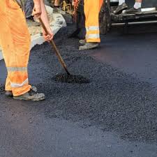 Why Choose Us For All Your Driveway Paving Needs in Sigourney, IA?